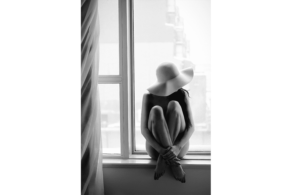 Woman by a Window