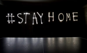 Stay Home written with light