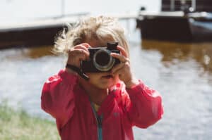 Toddler using a camera