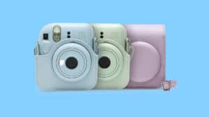 Instax-Case | Photography and video news, reviews and tips | Henry's Camera Three pastel Instax Mini 12 instant cameras in blue, mint green, and pink with matching cases on a blue background, ready for display.