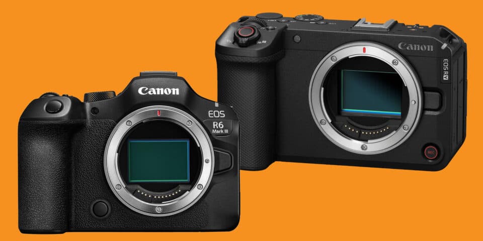Two Canon mirrorless cameras without lenses on an orange background, showcasing front lenses and grips.