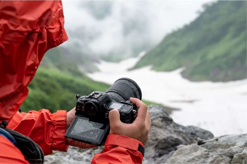 Photographer holding Nikon Z8 Camera for landscape photography