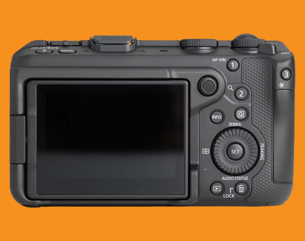 Back view of a black camera with a large LCD screen and circular control wheel on an orange background, showing buttons and dials on the right side.
