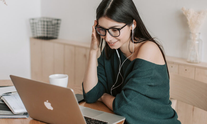 girl watching a video on a laptop